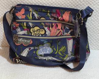 Sakroots crossbody bag with floral and bird pattern