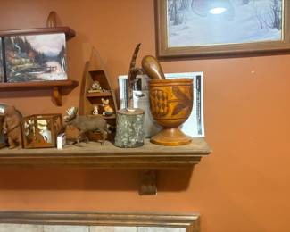 . . . mortar and pestle, bear, moose, canoe
