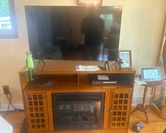 . . . nice TV stand and flat-screen TV