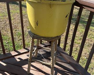 Vintage wooden stool and plastic tub