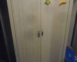1950's metal cabinet with shelves