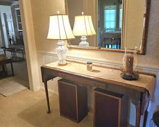 slim console and vintage light