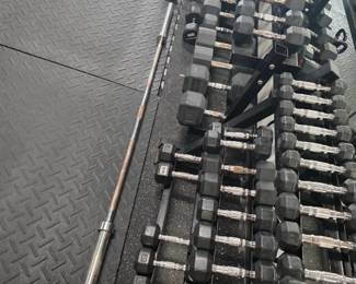 38 pairs of rubber hex dumbbells, plus two 4' long, 2 tier racks