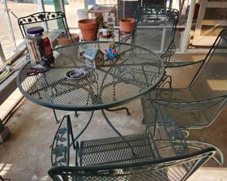 Wrought iron patio set with 4 chairs