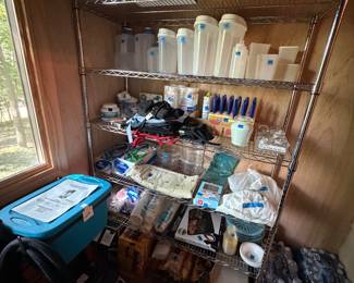 Eurosteam carpet cleaner, Duraflame logs, Tupperware, kitchen miscellaneous