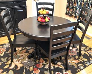 42" round black pedestal table with 4 chairs 