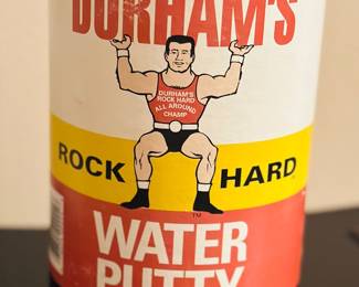 Vintage container of Durham's Rock Hard Water  Putty