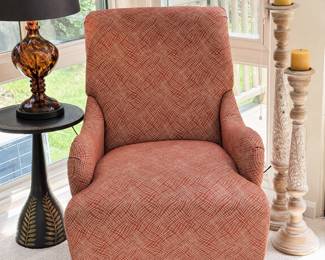 Lovely orange armchair, amber tortoise-glass table lamp, small round accent table 