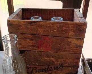 Bordens milk bottles and carrying case. EARLY 1900's
