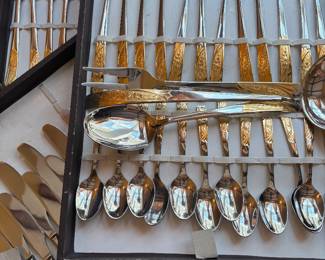 75 piece ornate gold floral accented flatware 