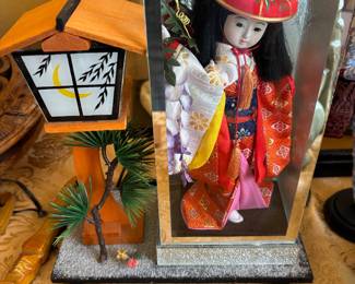Vintage Japanese costumed geisha doll in glass case with lighted wooden lantern 
