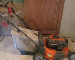 Self propelled lawn mower with bag
