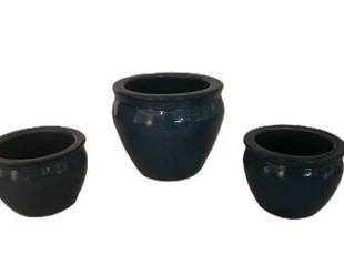 Three blue pottery planters