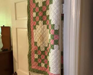 Several vintage quilts 