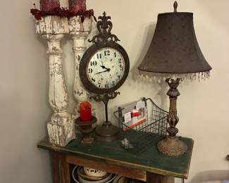 Faux clock with vintage wooden candle holders & table lamp