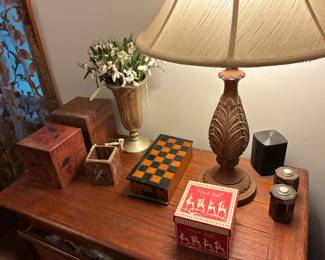 Boxes, Chess game, Table lamp, cards, metal vase on dresser