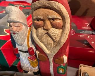 Carved and heavy cast santas
