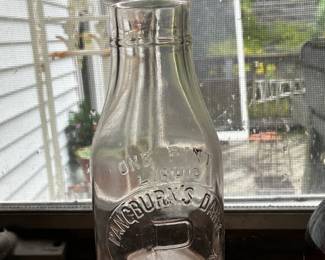 Pint sized glass milk bottle