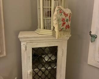 Bird cage and small dresser cabinet