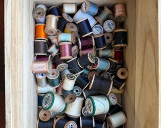 Antique wooden spools of thread