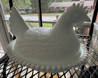 Antique hen on nest