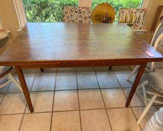 #66 - $350 - Danish table with built in leaf size 51"Lx33Wx29T
