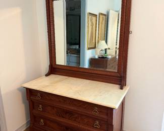 #78 - $450 - American Eastlake dresser 46x22x30 & mirror 42x50 swivel - on casters
