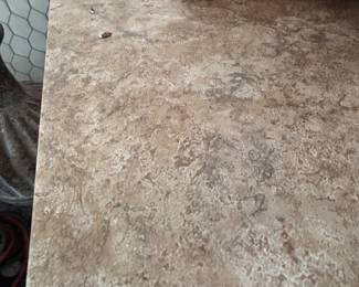 Tile flooring in boxes of previous picture.