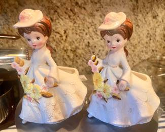 Sweet girls with flowers planters