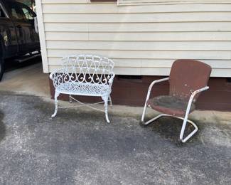 Cast iron garden bench and vintage patio chair