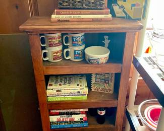 Cute bookcase with vintage cookbooks 
