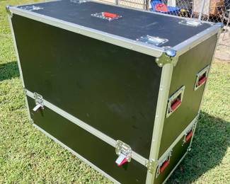 Traveling case containing a movie projection setup. 