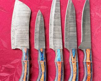 There’s going to be several sets of knives included in this auction. These are all handmade and are really beautiful.