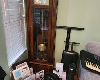 Grandfather clock, fans, frames