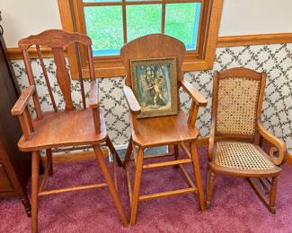 Vintage high chairs and child’s caned rocking chair