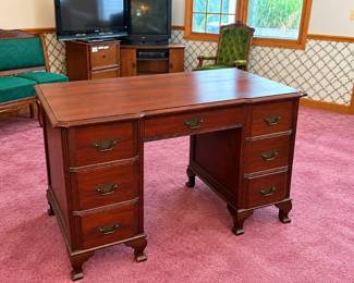 Dark wood (most likely cherry) desk in perfect condition