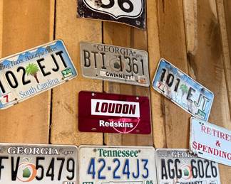 Vintage License Plate Collection with Route 66 Sign