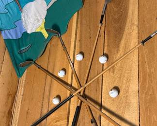 Vintage Golf Club Display with 19th Hole Flag