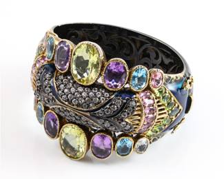 Butler & Wilson fine jewelry line-sem-precious stones including amethyst, peridot, citrine, diamonds in an enameled sterling bangle-this piece is quite beautiful!