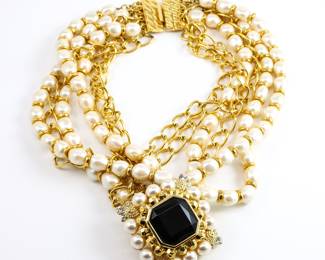 There are many pieces of high end fashion and designer jewelry available-from Chanel, Hermes, Alexis Bittar, Dior, Schiaparelli, William DeLillo, Alan Anderson, Kenneth Lane, Gillian Julius, Fairchild Baldwin, and so many more!