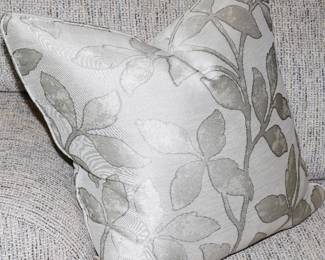 There are beautiful silk throw pillows throughout the home