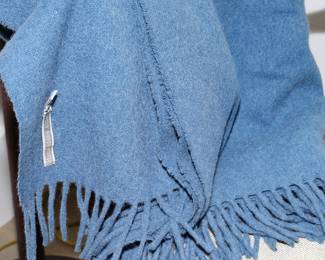 There are several beautiful woven throws throughout the home