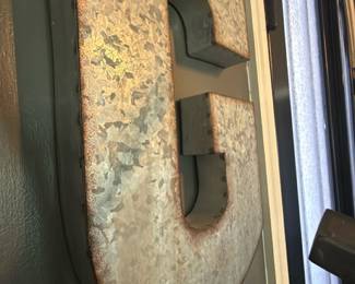 rustic G sign