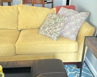 yellow L-shaped sectional sofa