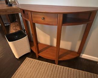 half-moon wooden console table