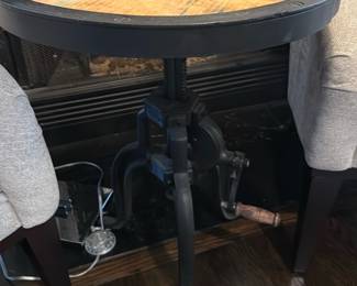 industrial-style, adjustable-height round accent table