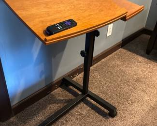 adjustable-height and tilting rolling laptop cart
