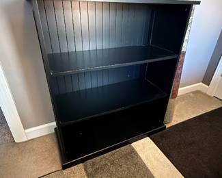 black wooden bookcase 