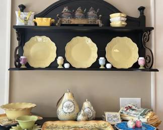 Black Wall Shelf with Ceramic Tableware and Kitchen Accessories