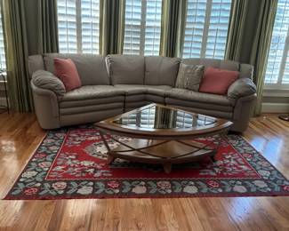 Curved Sectional Sofa, Glass Top Coffee Table and Area Rug